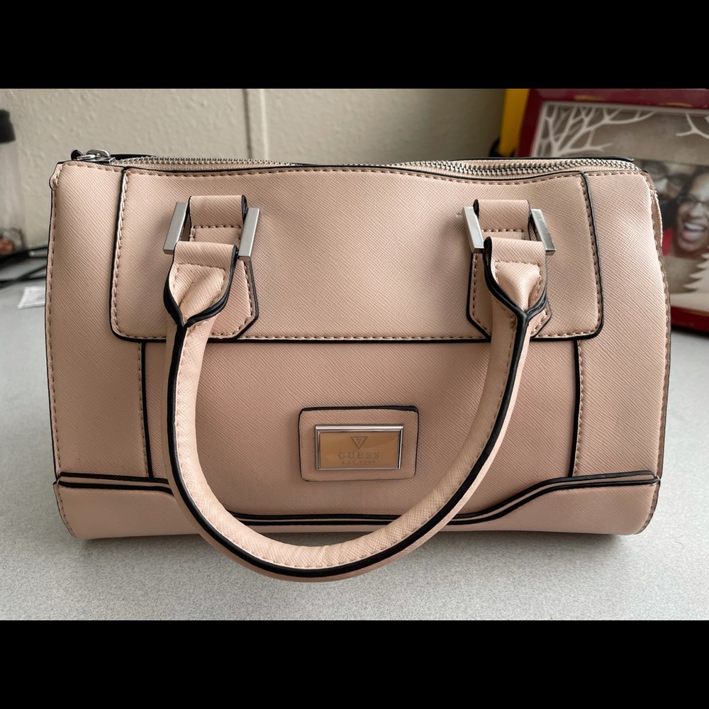 New with Tags inside Medium Peach Color Guess Bag
